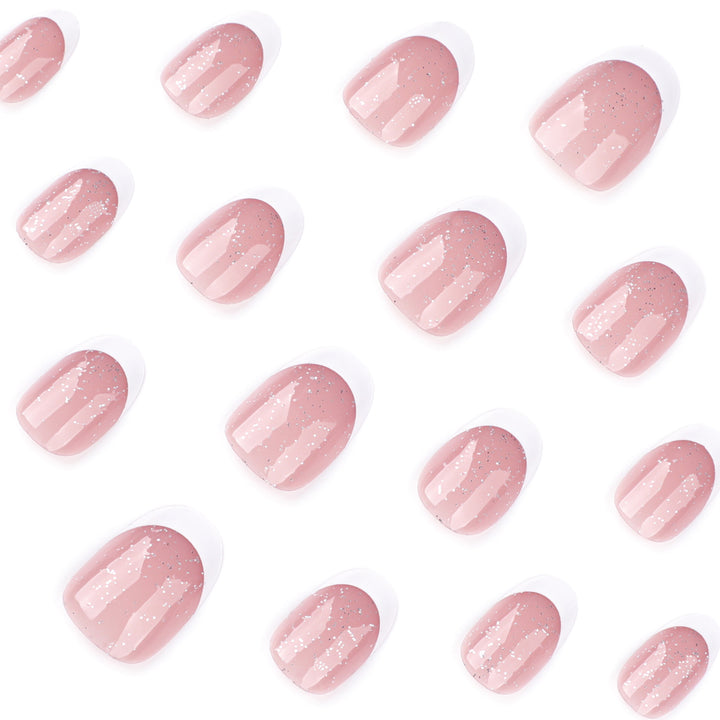 Artful nail art with glitter in gentle tones and elegant tips Kalsten