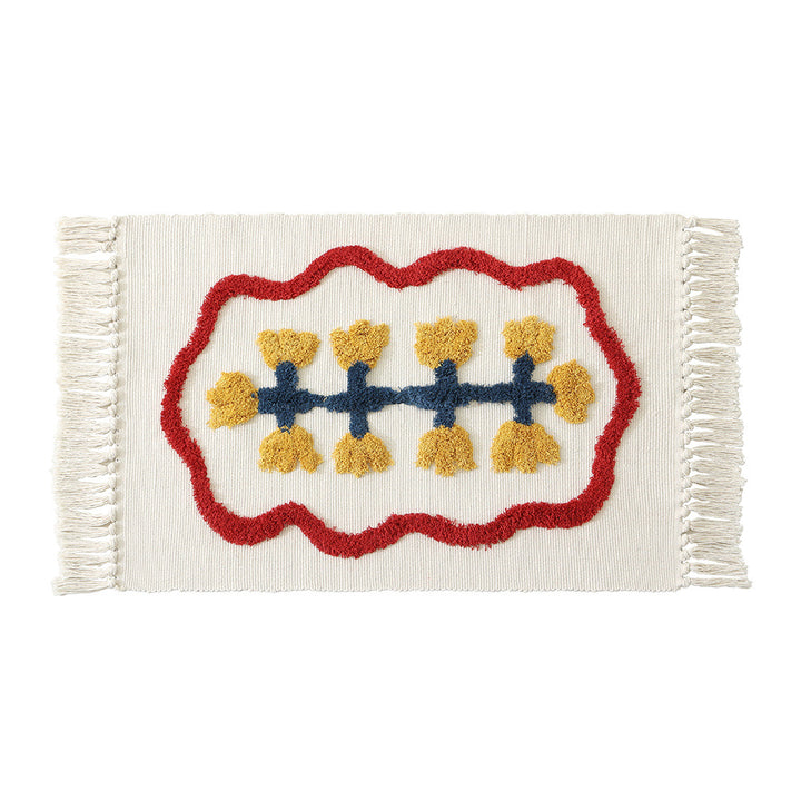 Decorative cotton bath mat with fringes and textured floral border