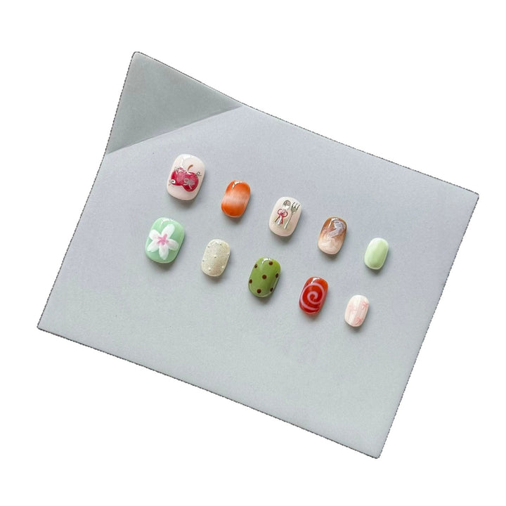 Artistic Press-On Nail Set with Unique Sketch Designs