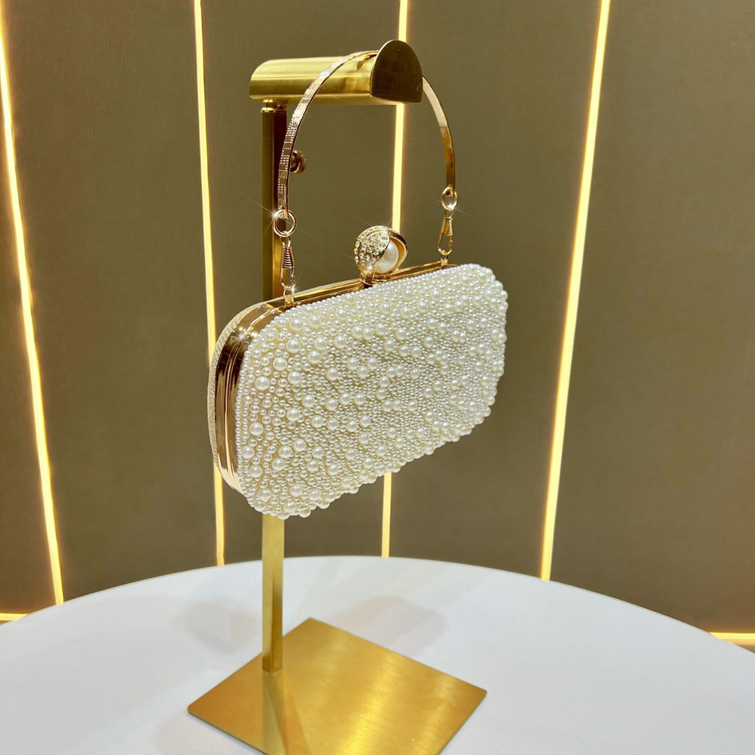 Decorative Pearl Clutch with Gold Accents