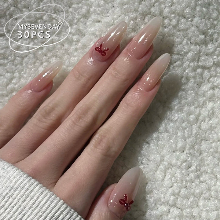 Elegant Stiletto Press-On Nails with Decorative Bow Accents Kalsten
