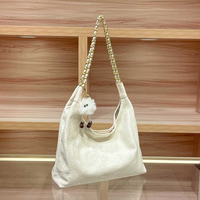 Chic Shoulder Bag with Decorative Charm