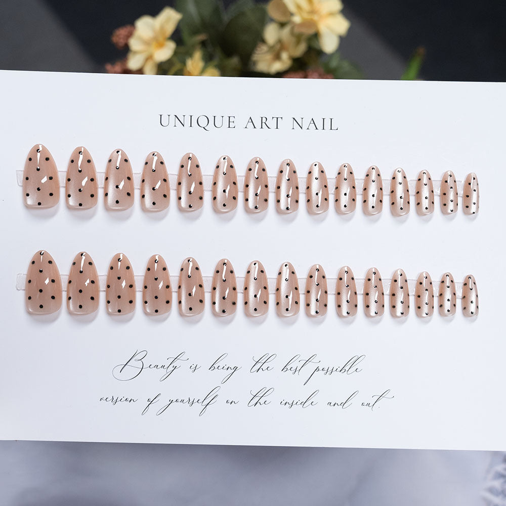 Artistic Press-On Nails with Polka Dot Design
