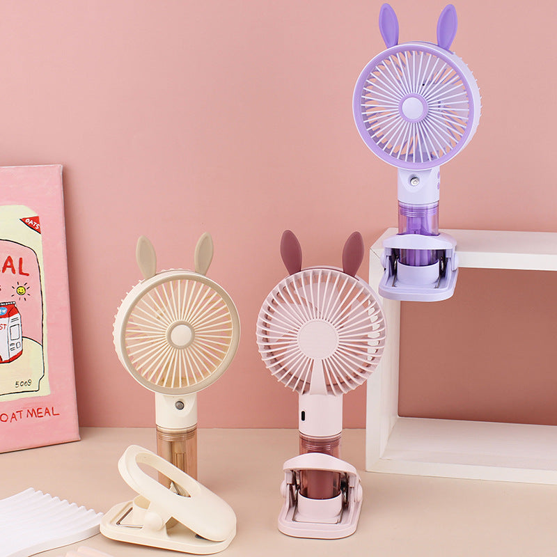 Cooling compact rechargeable clip-on misting handheld fan with detachable water reservoir and adjustable tilt Kalsten