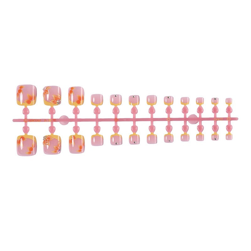 Artificial nail set with floral design and glitter accents Kalsten