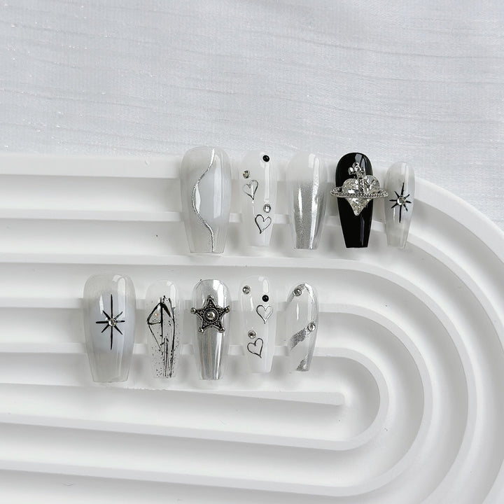 Artistic Press-On Nail Art Set with Heart and Celestial Designs