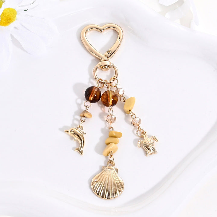 Keychain with Sparkling Sun Motif Kalsten