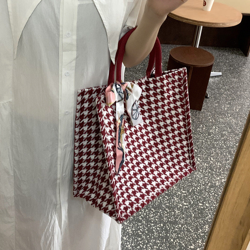 Elegant Houndstooth Handbag with Decorative Bow