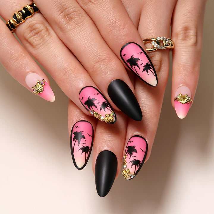 Artful nail art with palm motifs and glitter accents Kalsten