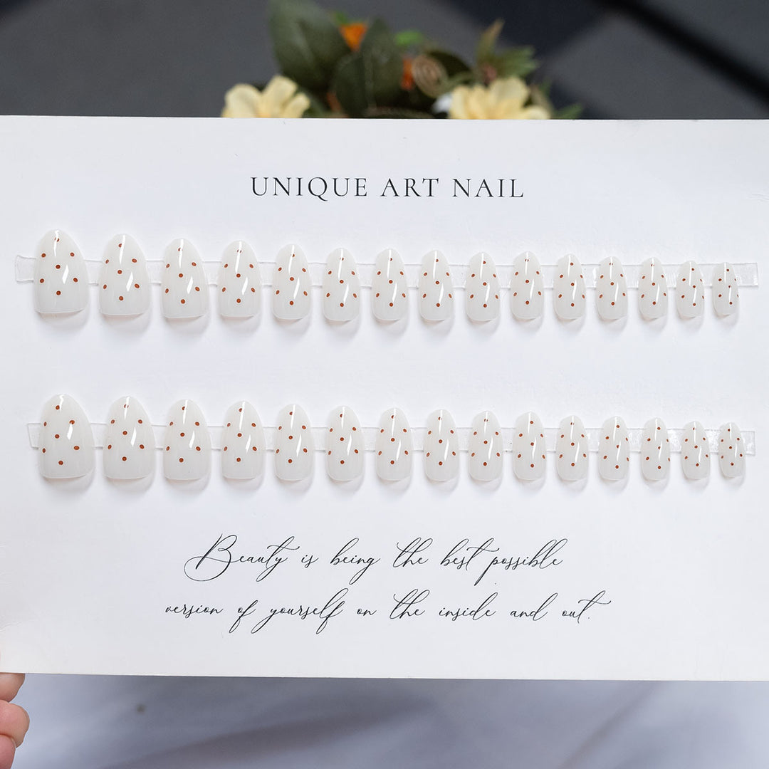 Artistic Press-On Nail Set with Unique Spot Design