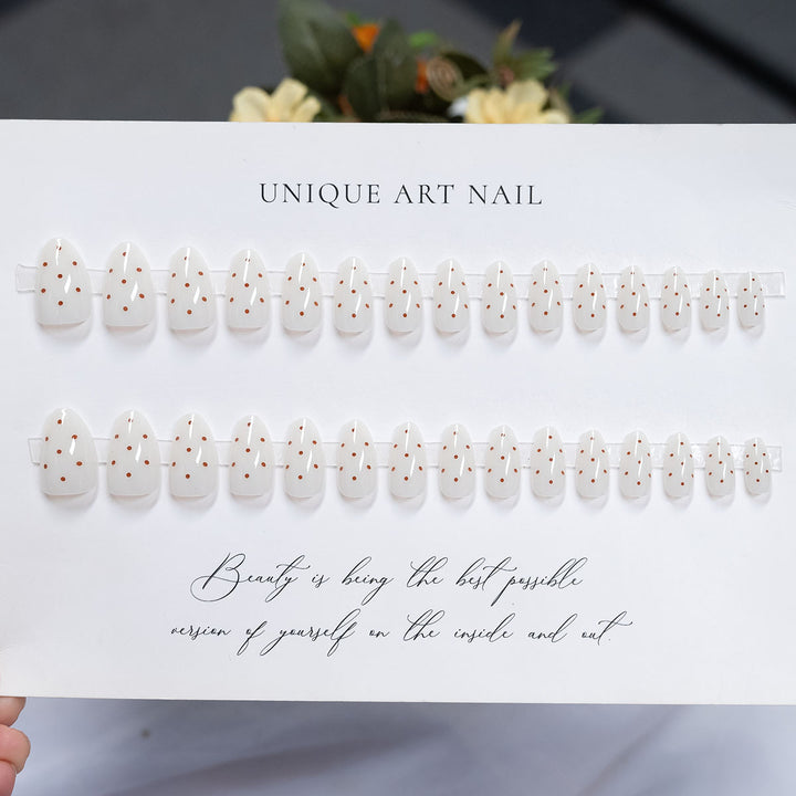 Artistic Press-On Nail Set with Unique Spot Design