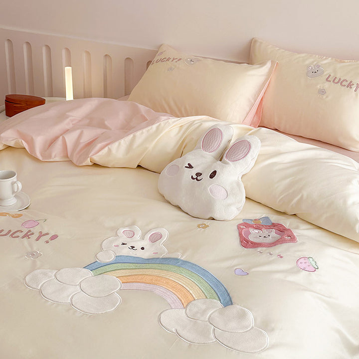 Playful cotton bedding set with appliqués and ruffles
