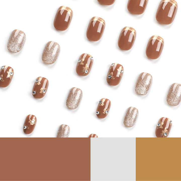 Elegant Nail Decoration with Glitter and Floral Accents Kalsten