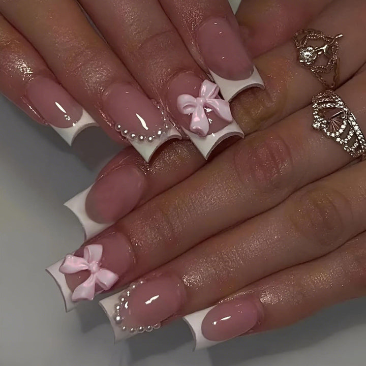 Artifical nail set with romantic bows and elegant accents Kalsten