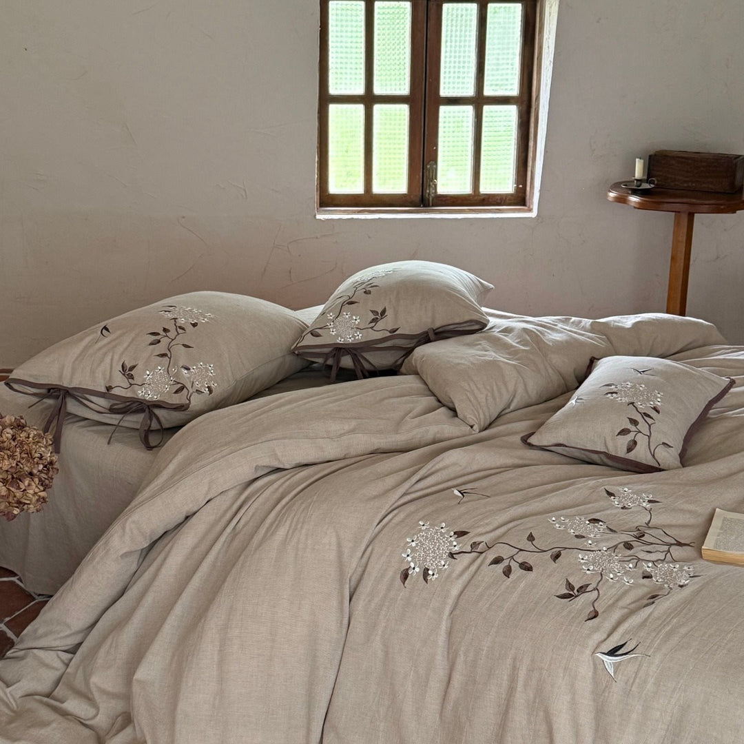 Embroidered bedding set made of linen look with decorative stripes and floral embroidery