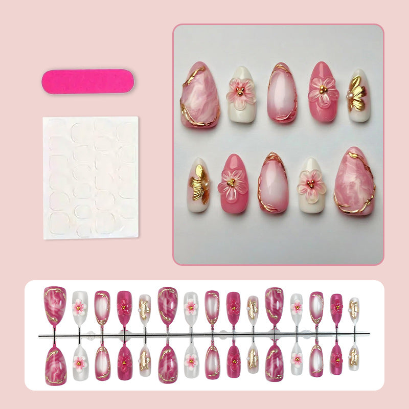 Acrylic nail set with floral accents and glitter details Kalsten
