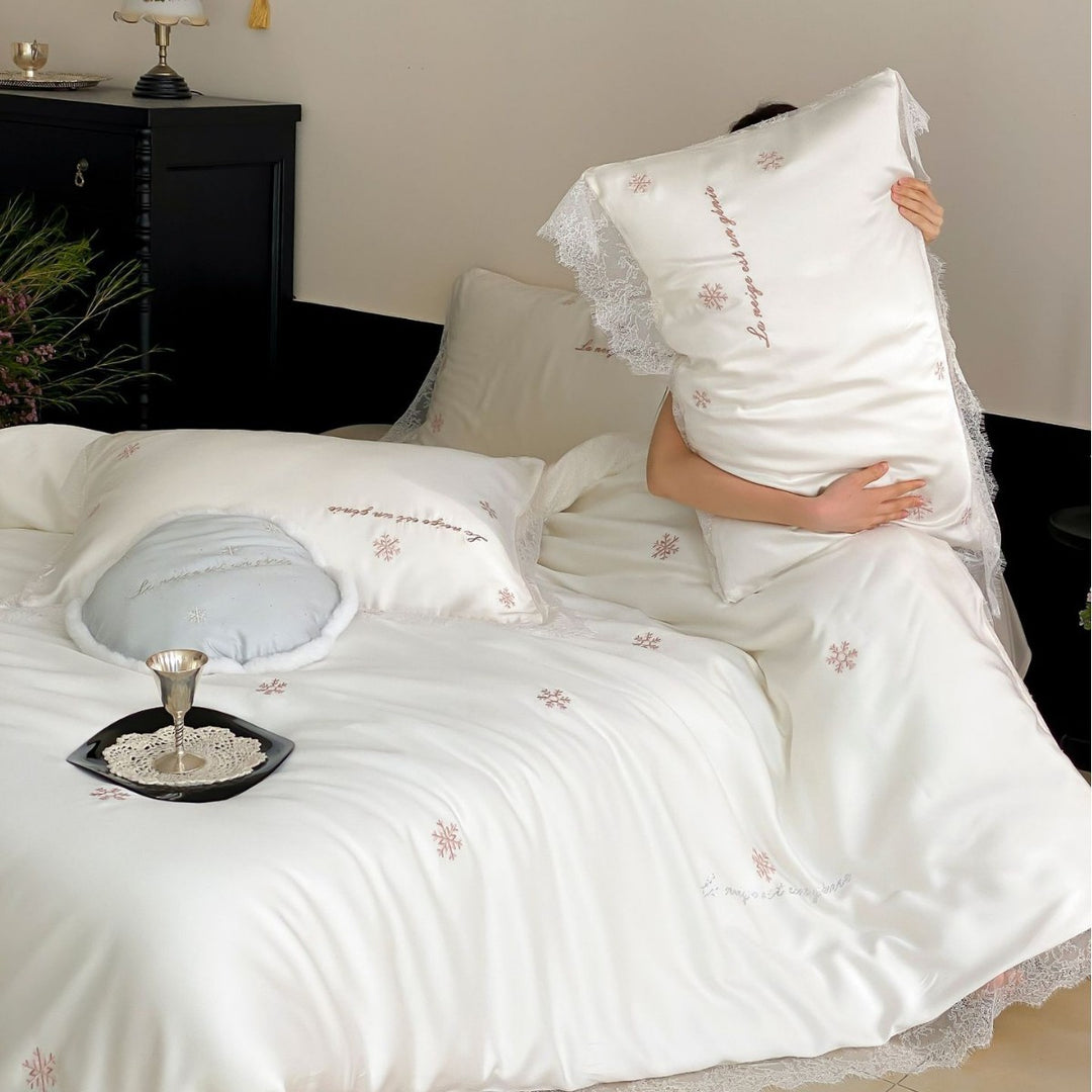 Luxurious satin bedding set with lace trim and snowflake embroidery