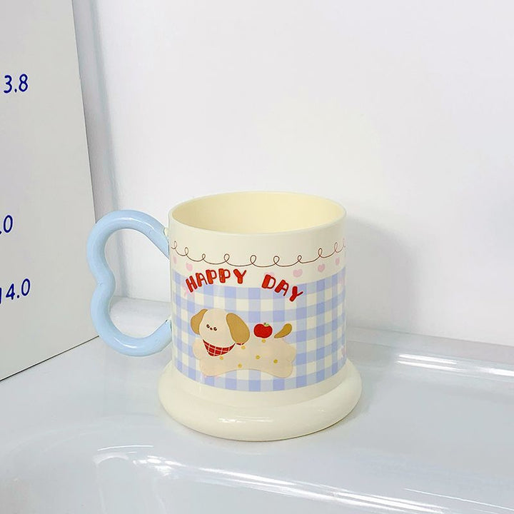 Ceramic mug with playful puppy motif Kalsten