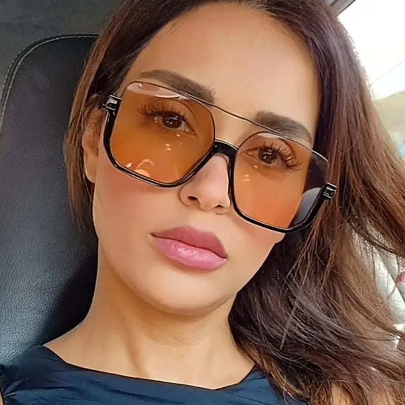 Women's square sunglasses with transparent frame and green tinted lenses Kalsten