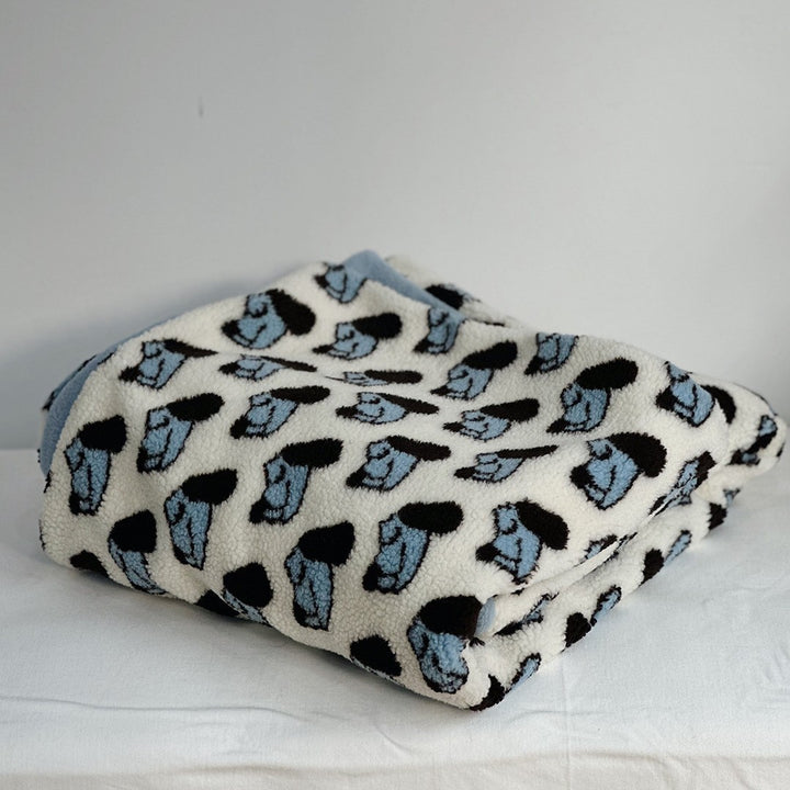 Plush Sherpa throw blanket with abstract pattern and extra-soft teddy fleece