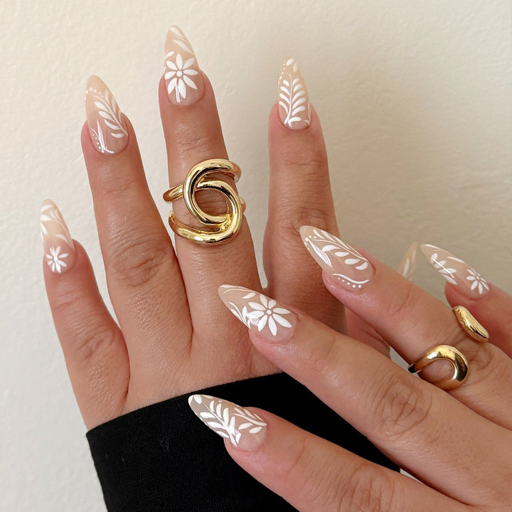 Stiletto nails with floral decorations Kalsten