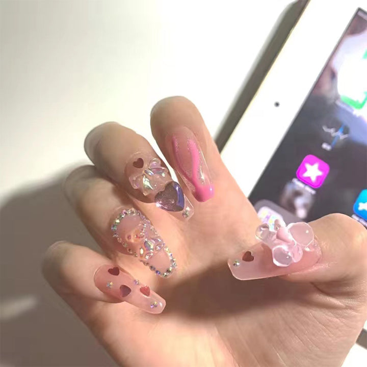Artful Gel Nails with Elegant Floral Design and Glitter Accents Kalsten