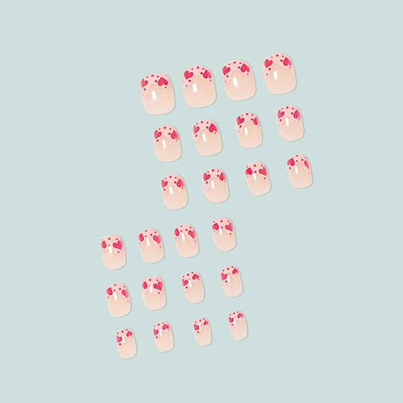 Artfully designed nail tips with heart motifs Kalsten