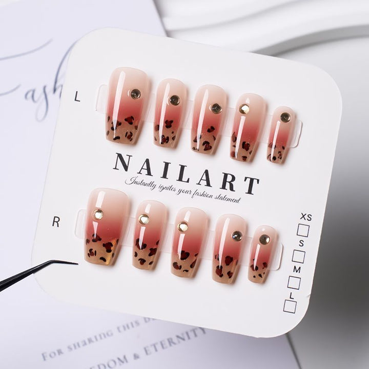 Artificial nails with elegant leopard pattern and glitter accents Kalsten