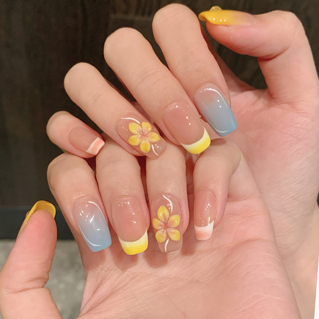 Artistic Press-On Nail Set with Floral Designs and Ombre Accents