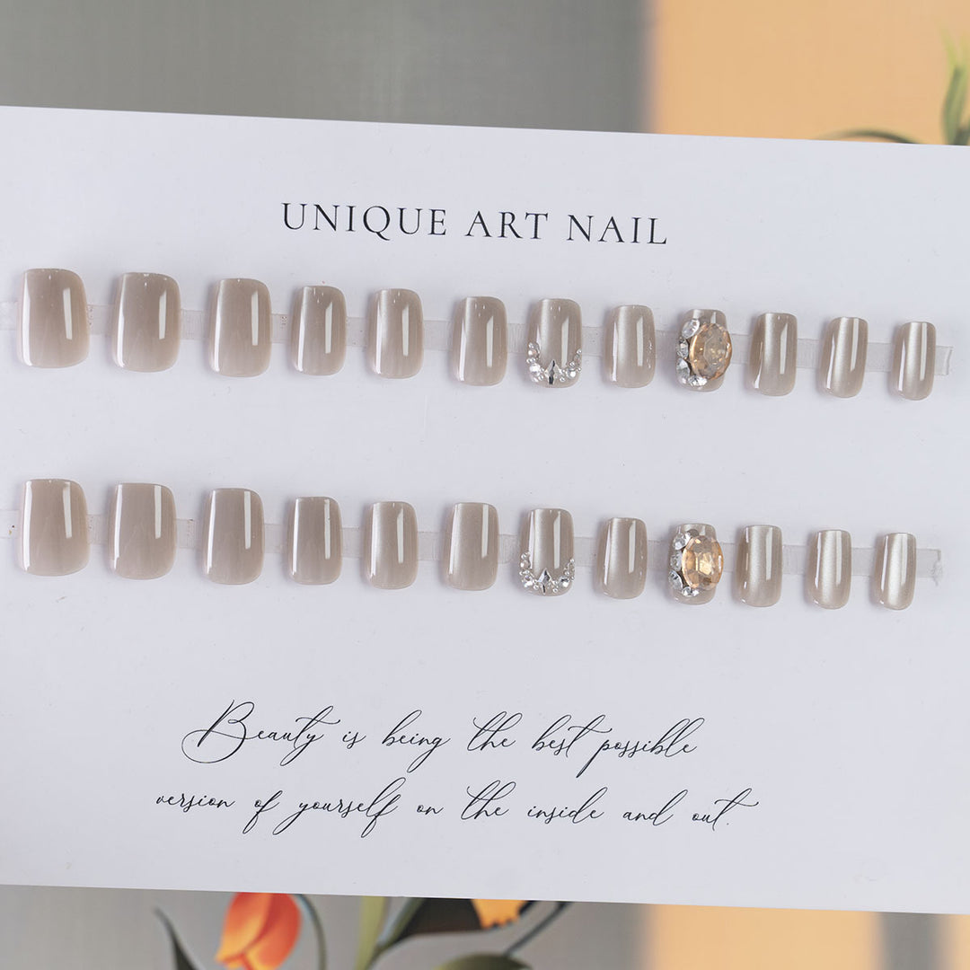 Decorative Nail Art with Rhinestone Accents