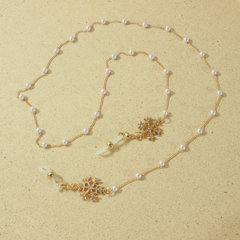 Elegant glasses holder chain with pearls and snowflake pendant Kalsten