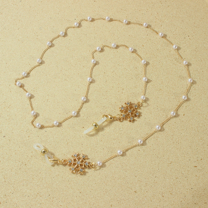 Elegant glasses holder chain with pearls and snowflake pendant Kalsten