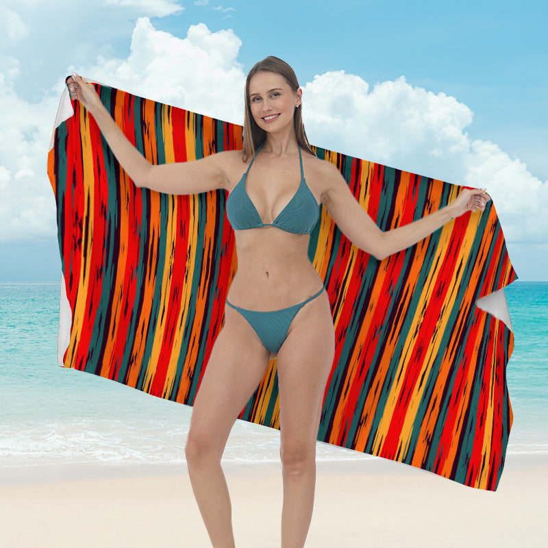 Beach towel with vibrant tropical plant motif Kalsten