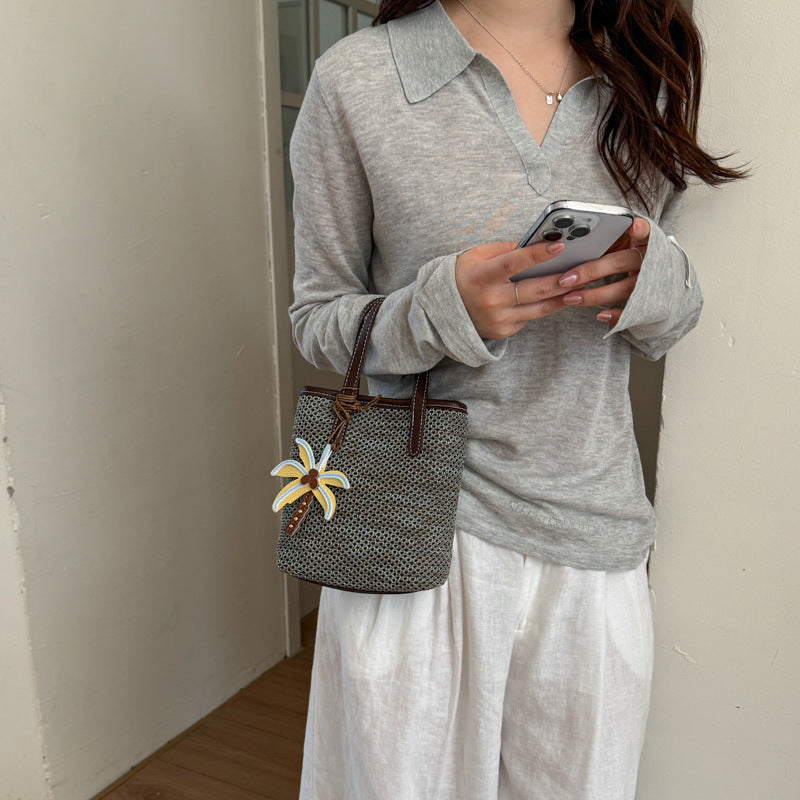 Woven Beach Handbag with Decorative Charm