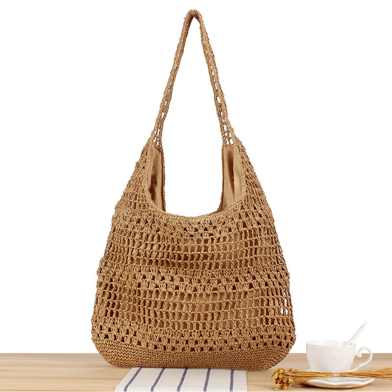 Handbag with floral appliqué Made of natural material Kalsten