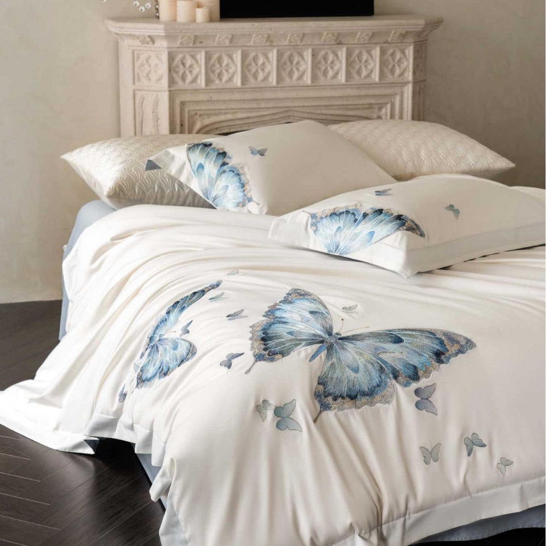 Embroidered cotton satin bedding set with blue butterfly motif