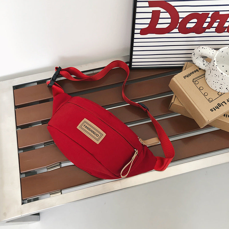 Sleek Multi-Compartment Sling Bag