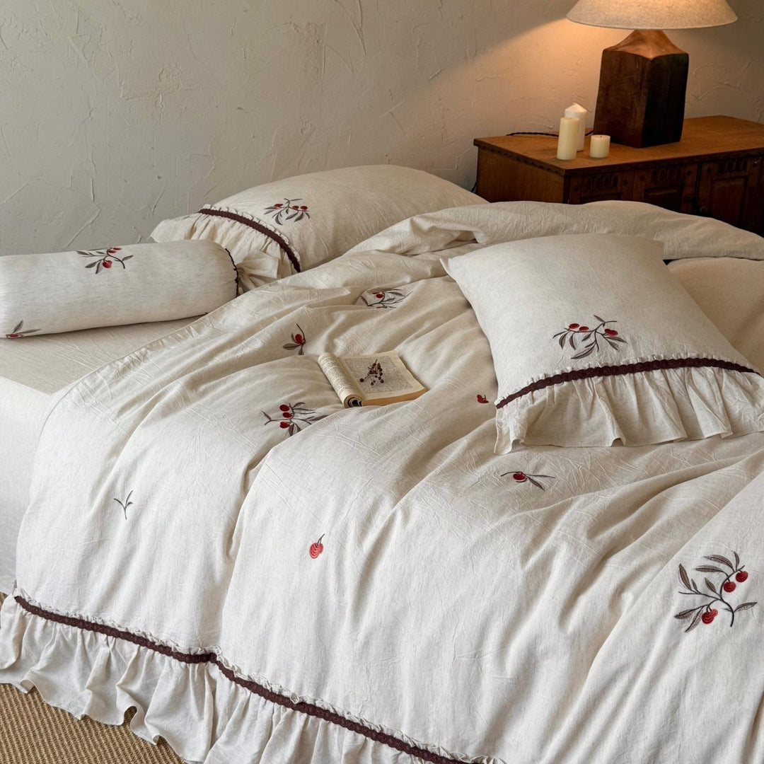 Linen bedding set with cherry embroidery and ruffles