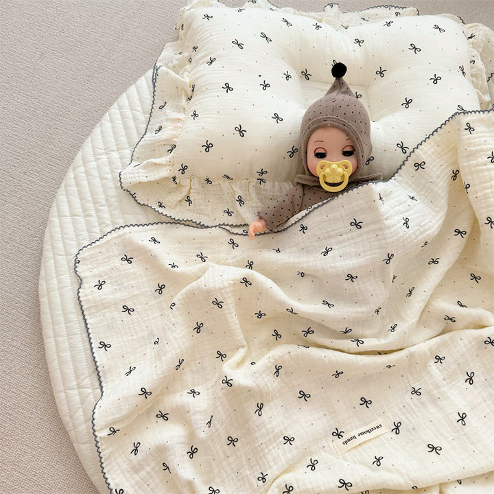 Unisex Muslin Blanket with delicate floral design and elegant ruffles Kalsten