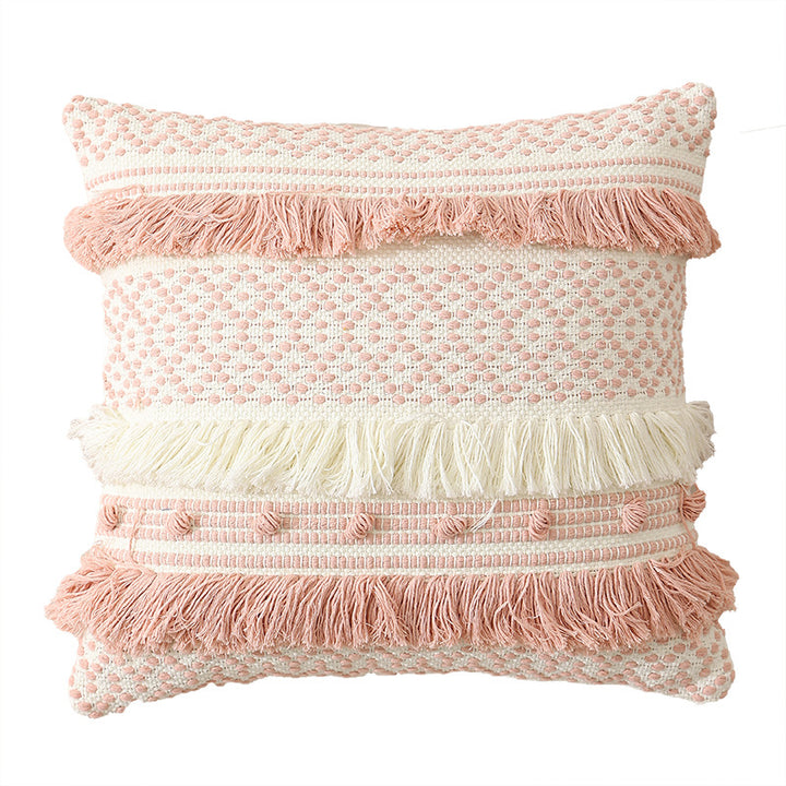 Textured Boho decorative pillow with fringes, tassels, and woven dot pattern