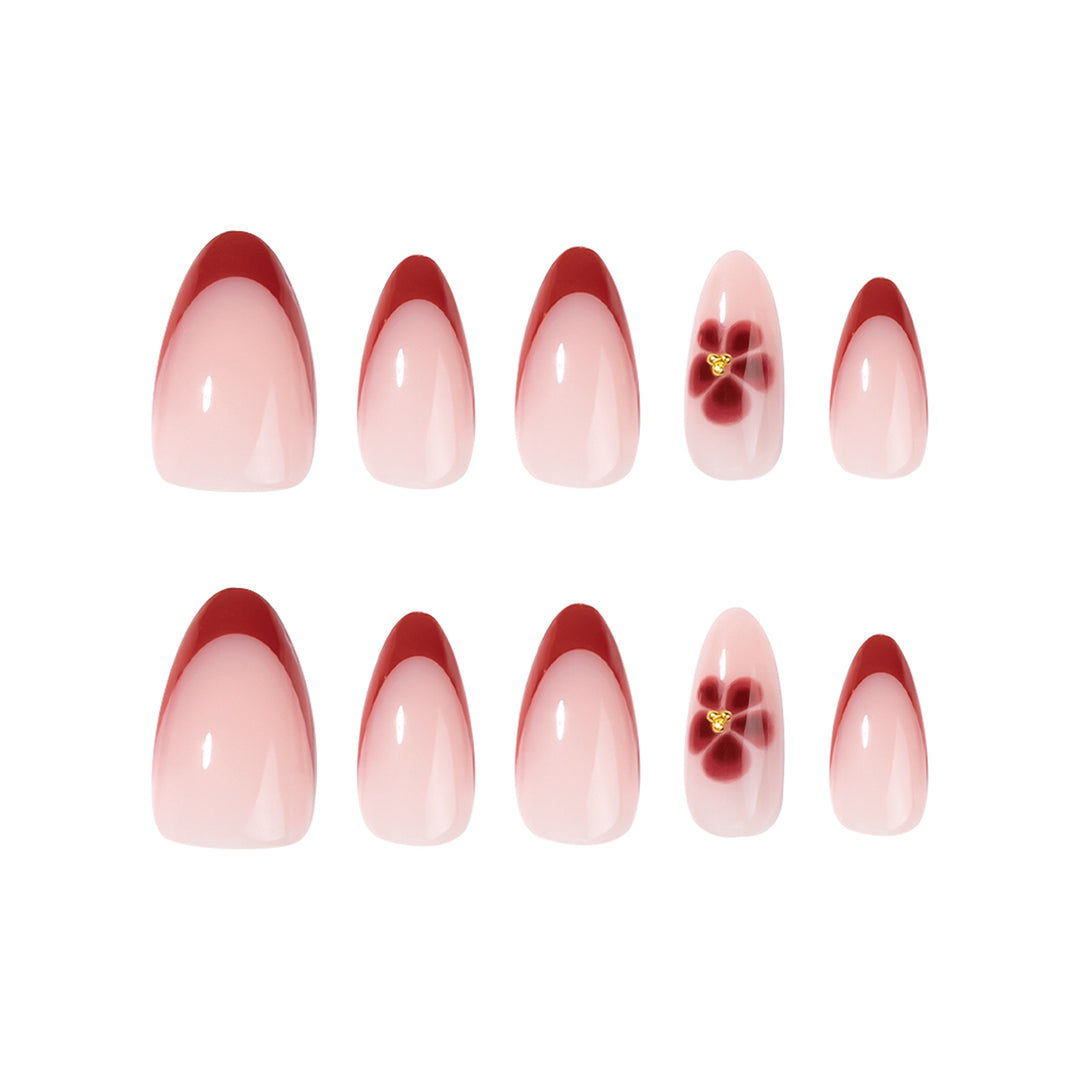 Elegant and artistically designed stiletto nails with flower design Kalsten