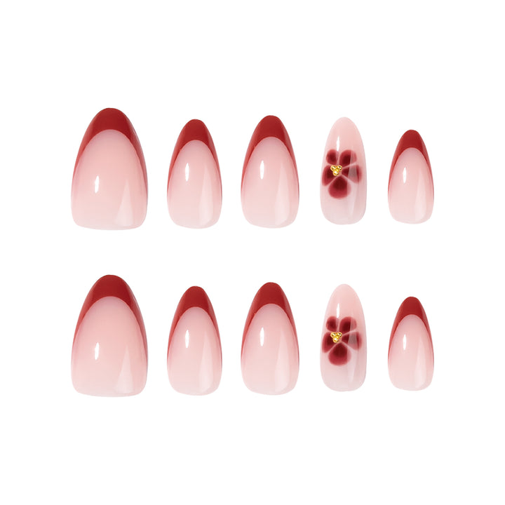 Elegant and artistically designed stiletto nails with flower design Kalsten