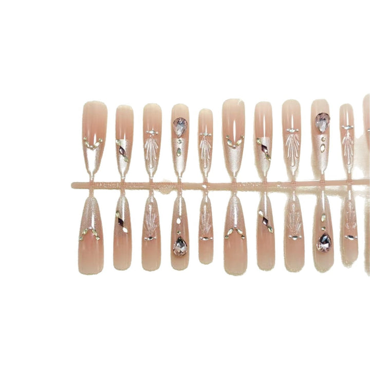 Artificial nails with glamorous crystal embellishments Kalsten