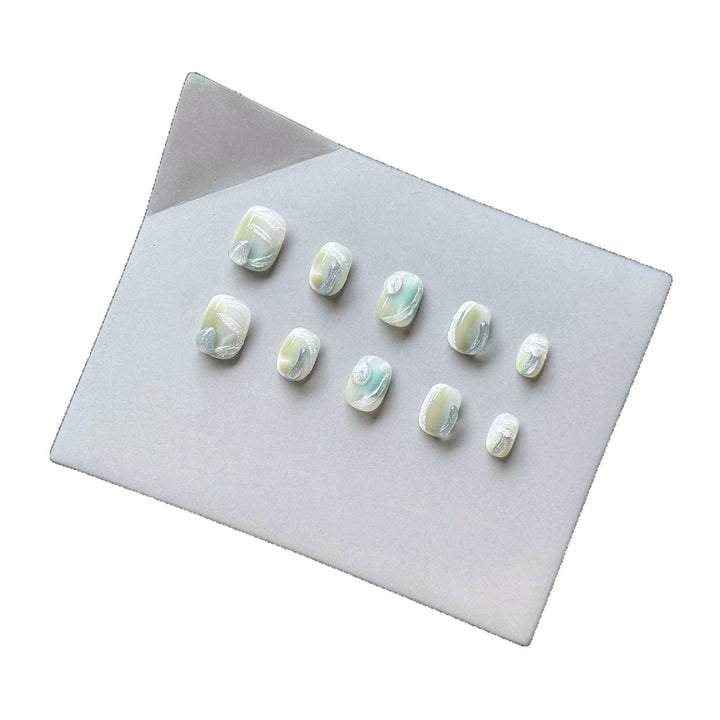 Artistic Press-On Nail Set with Glossy Marble Design