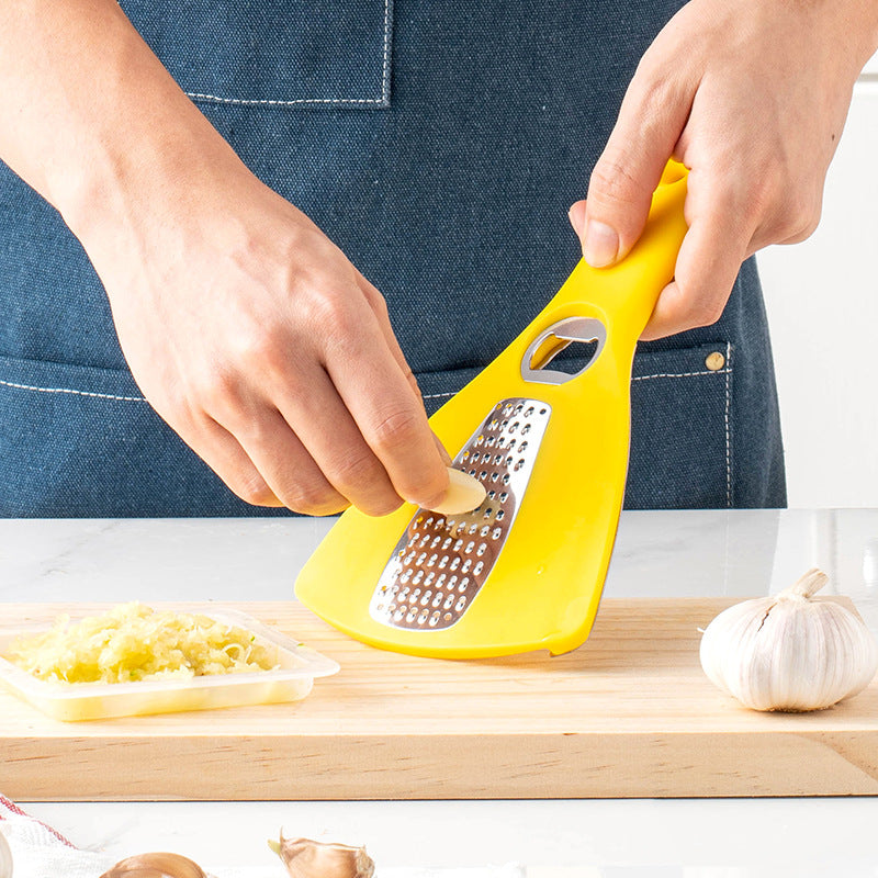 Multifunctional kitchen grater with integrated bottle opener function Kalsten