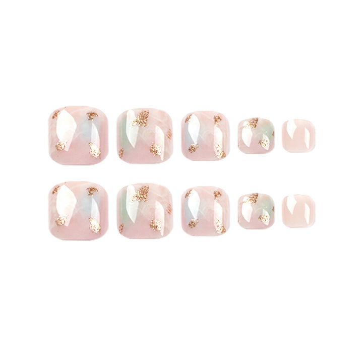 Artful toenail art with elegant marble and gold accents Kalsten