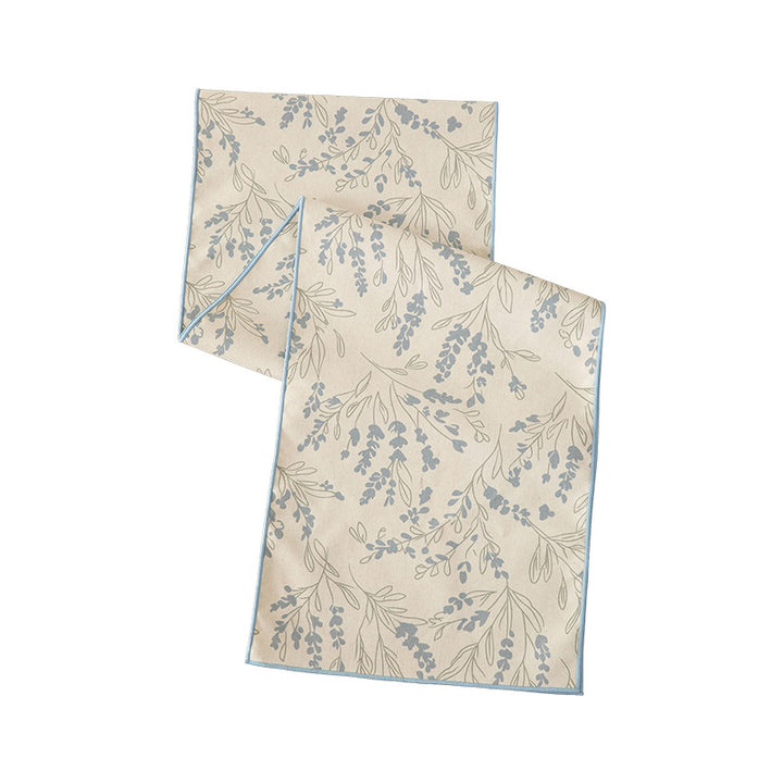 Woven table runner in botanical leaf pattern made of cotton blend Kalsten