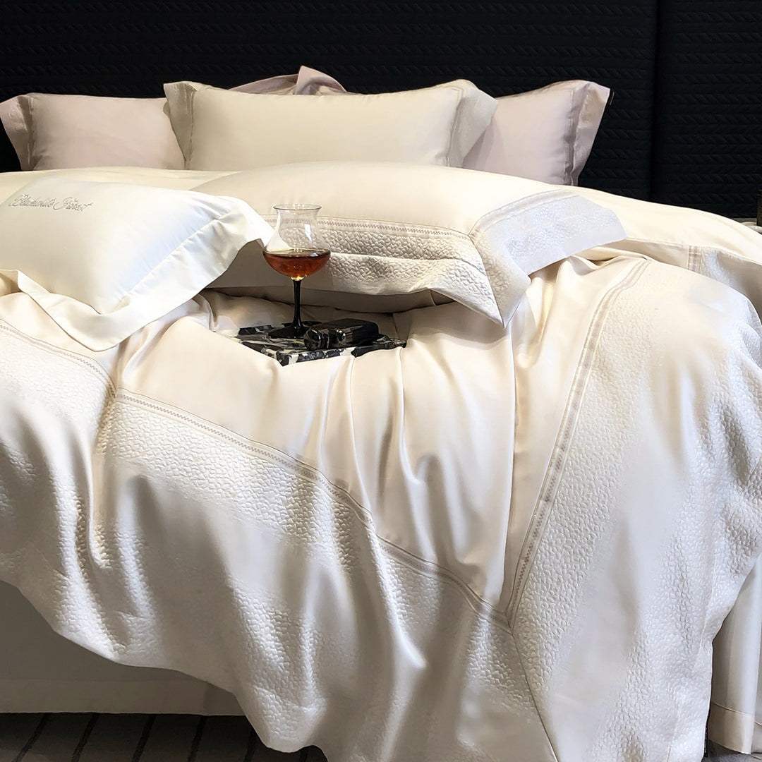 Premium cotton satin bedding set with structured matelassé border and hotel closure