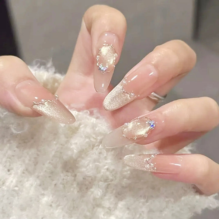 Art nail set with elegant gold glitter design Kalsten