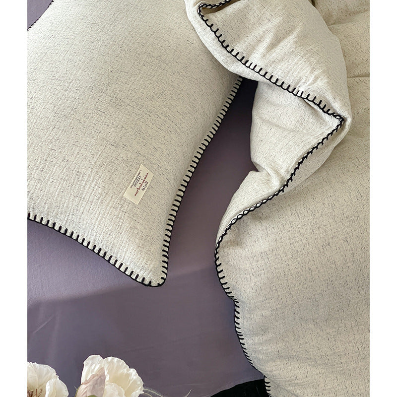 High-quality bedding set made of cotton-linen with fine texture and contrasting decorative seam